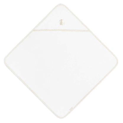 White diamond-shaped towel with gold trim on a white background