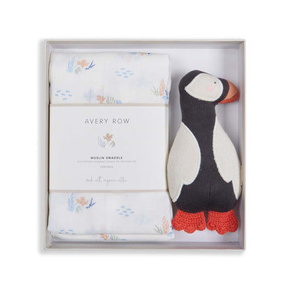 Baby gift set with swaddle and penguin rattle in a box, featuring the brand 'Avery Row'.