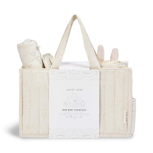 Beige tote bag with baby items and 'Avery Row' label on a white background