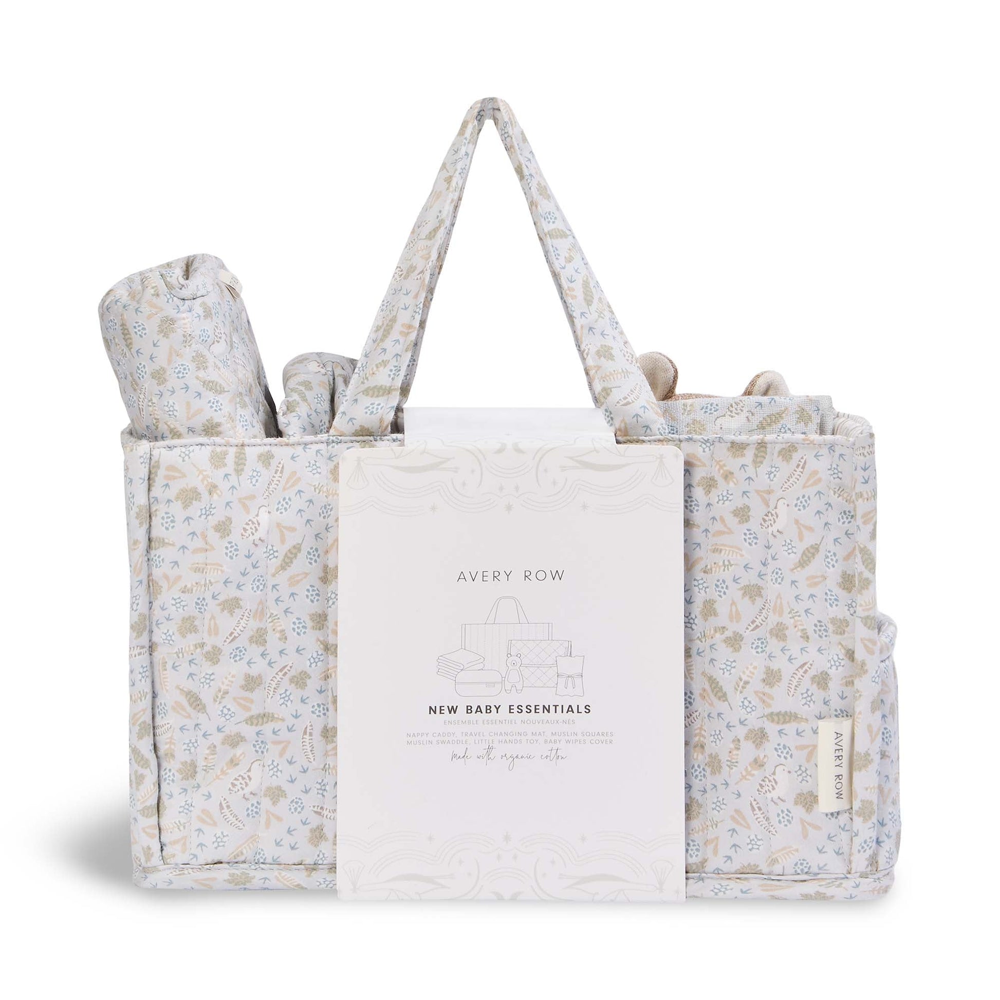 Floral-patterned baby gift set with a tote bag, blanket, and rolled item on a white background.