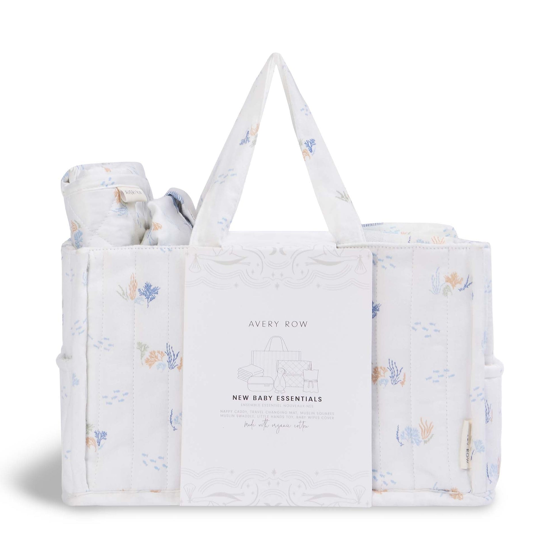 Baby gift set with a tote bag and wrapped items on a white background