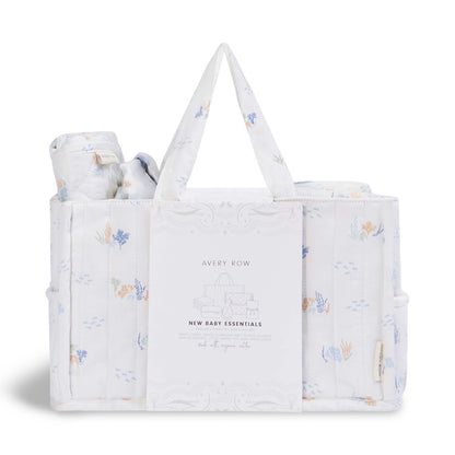 Baby gift set with a tote bag and wrapped items on a white background