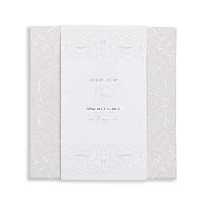 White baby swaddle blanket with 'Avery Row' branding on a white background