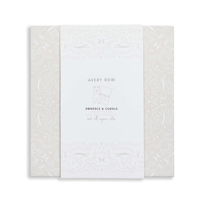 White baby blanket with subtle pattern and 'Avery Row' branding on a white background