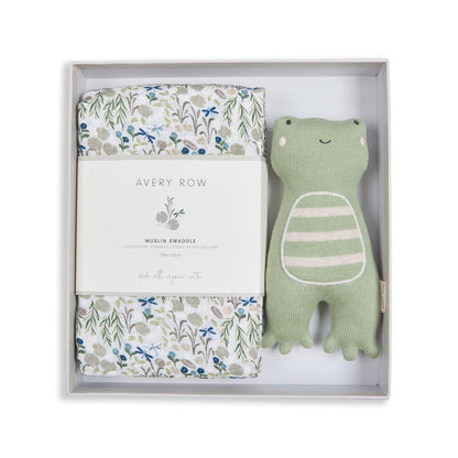 Baby gift set with swaddle, blanket, and green plush toy in a box, featuring 'Avery Row' branding.