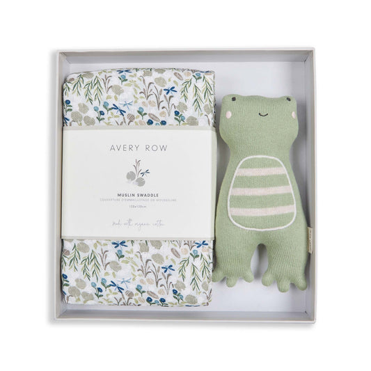 Baby gift set with swaddle, blanket, and green plush toy in a box, featuring 'Avery Row' branding.