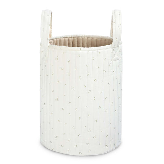 White fabric storage basket with handles on a white background