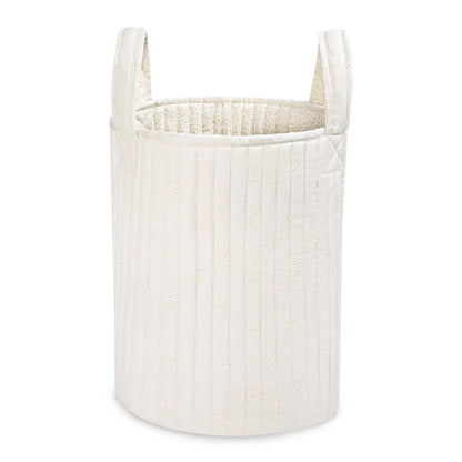 White woven laundry basket on a white background