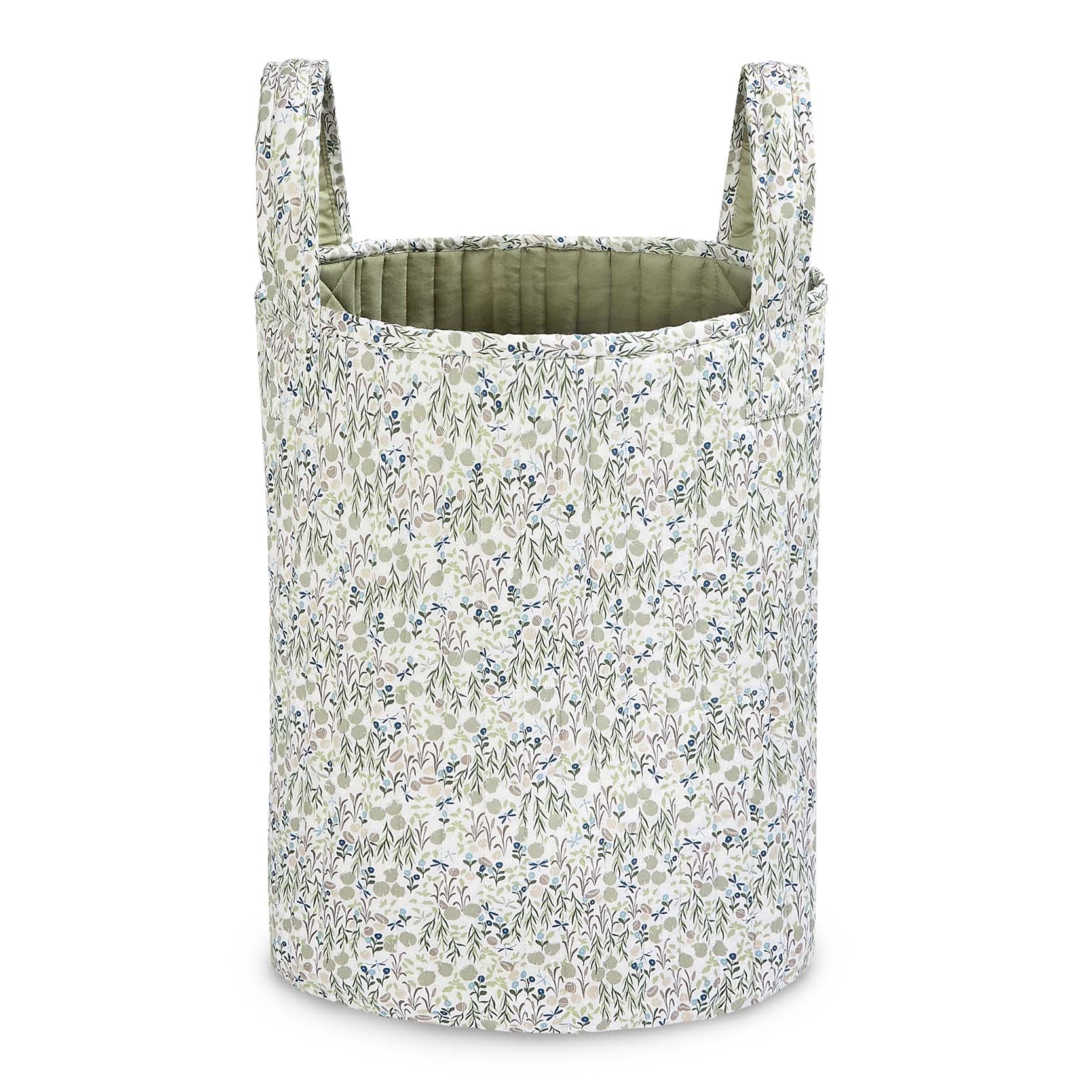 Floral-patterned laundry basket on a white background