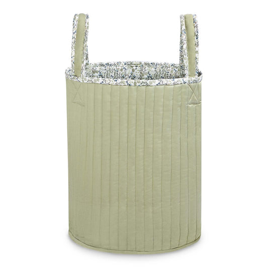 Green quilted storage bag with silver lining on a white background