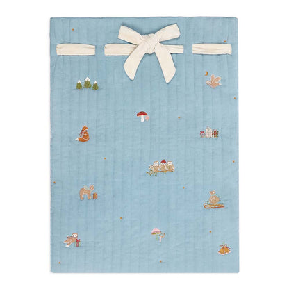 Blue baby blanket with embroidered designs and a white bow on a white background
