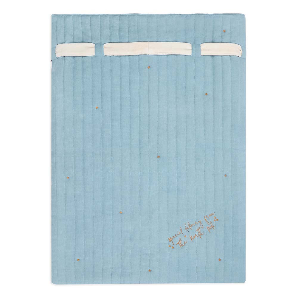 Blue textured blanket with white trim and embroidered text on a white background