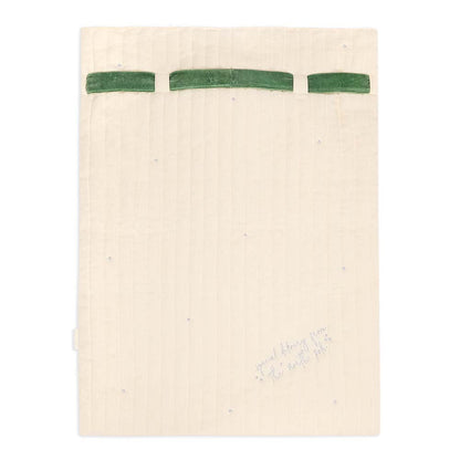 Beige towel with green stripes on a white background