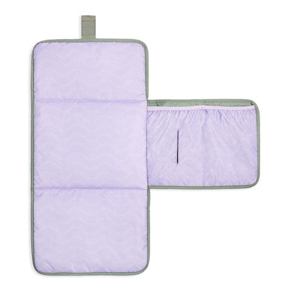 Purple diaper bag with a green strap on a white background