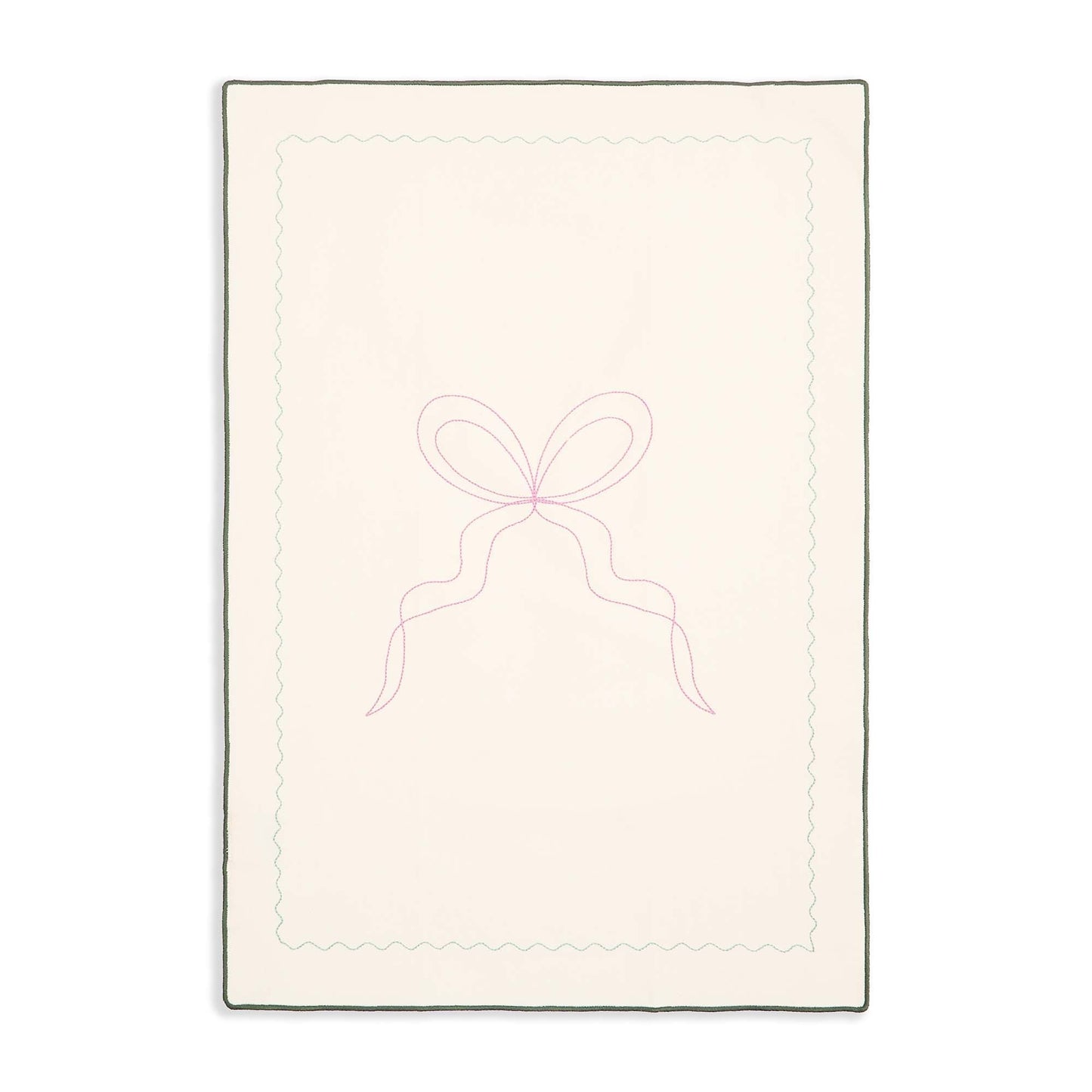 Rectangular quilt with a bow design on a white background