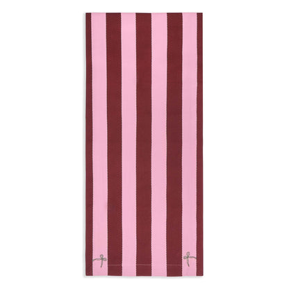 Striped towel with pink and brown vertical stripes on a white background
