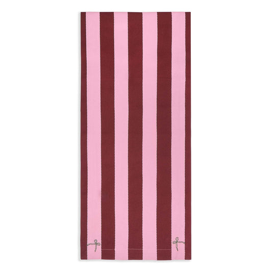 Striped towel with pink and brown vertical stripes on a white background