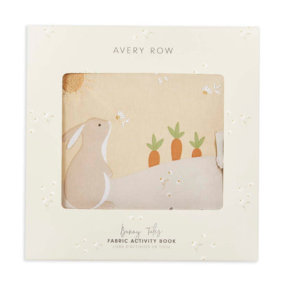 Fabric activity book with bunny design on a beige background, featuring the brand 'Avery Row'.