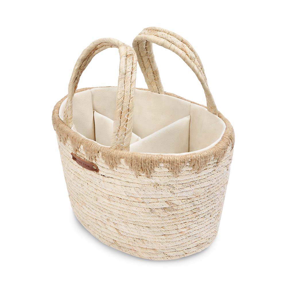 Woven basket with handles on a white background