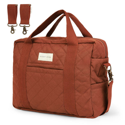 Brown quilted bag with straps on a white background