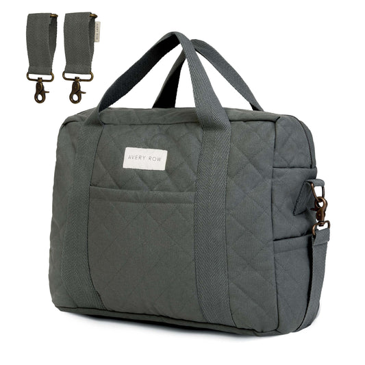 Gray quilted bag with straps on a white background