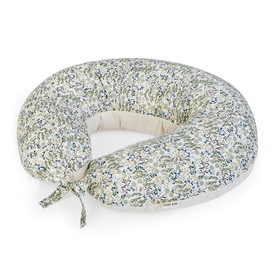 Floral patterned nursing pillow on a white background
