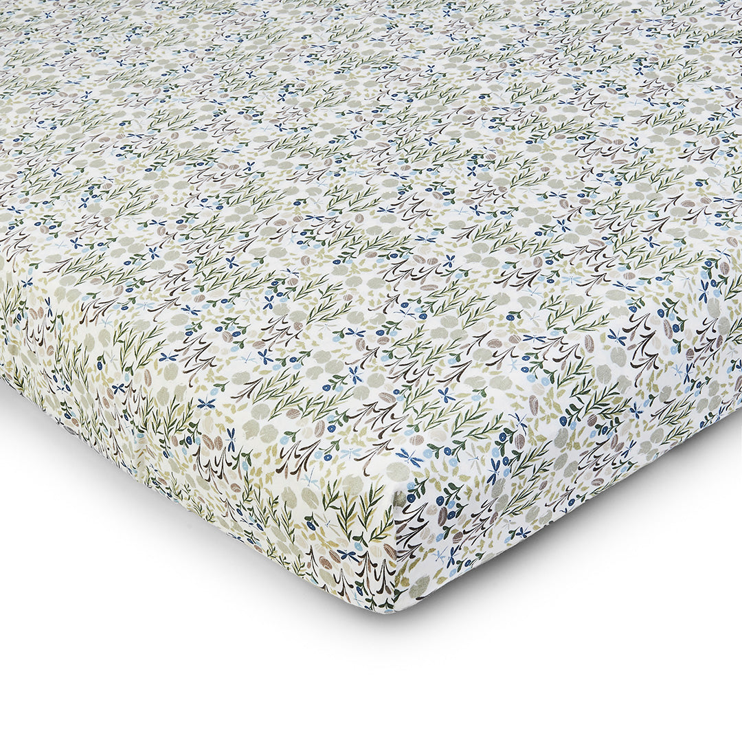 Floral patterned fitted sheet on a white background