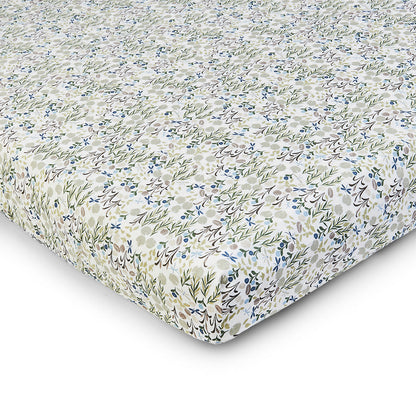 Floral patterned fitted sheet on a white background