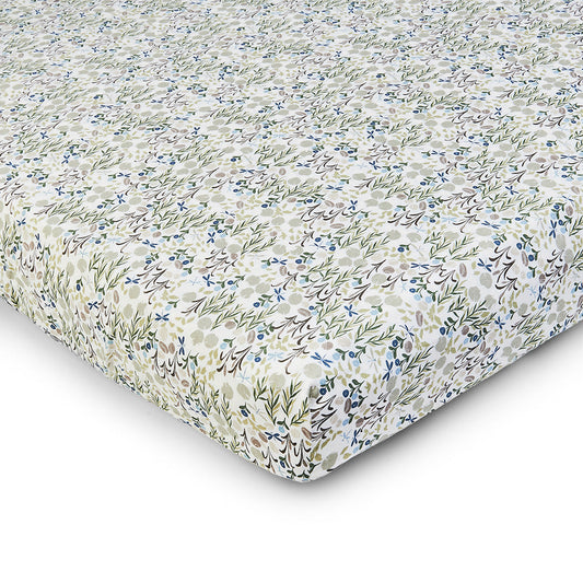 Floral patterned fitted sheet on a white background