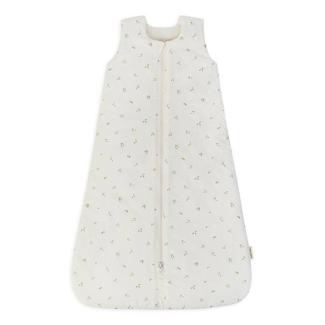 White baby sleeping bag with subtle pattern on a white background