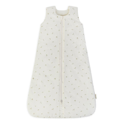 White baby sleeping bag with subtle pattern on a white background