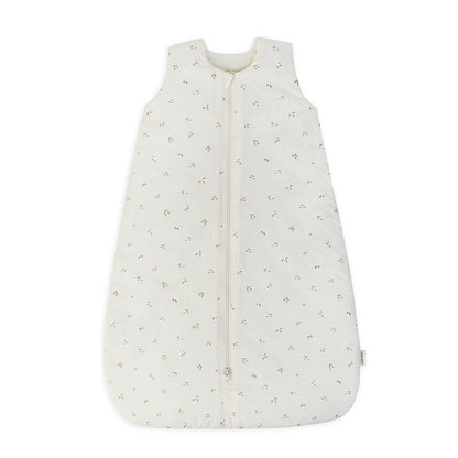 White baby sleeping bag with subtle pattern on a white background