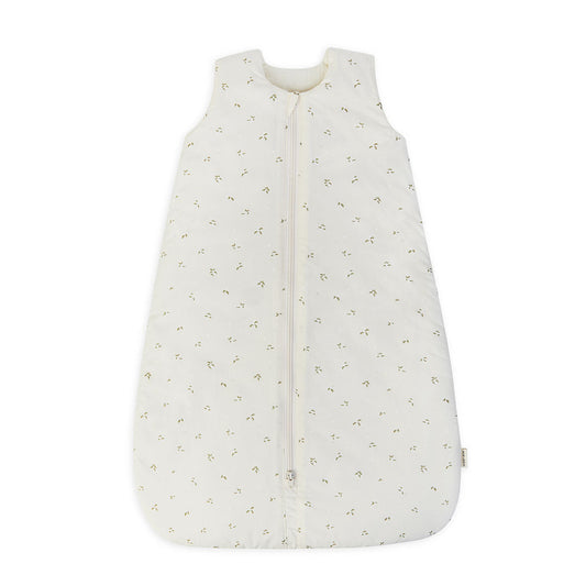 White baby sleeping bag with subtle pattern on a white background