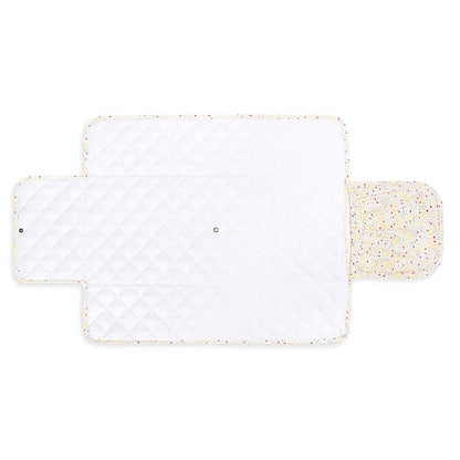 White quilted mat with a colorful speckled edge on a white background