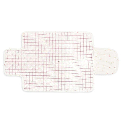 Grid-patterned bath mat with a white border on a white background