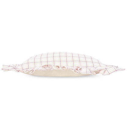 Checkered pillow with ruffle trim on a white background