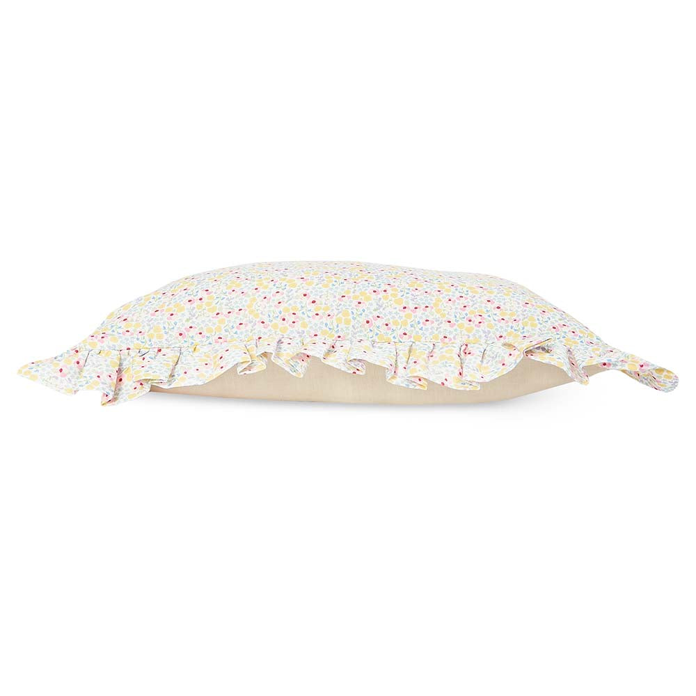 Floral-patterned pillow on a white background