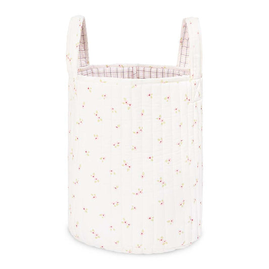 White laundry basket with a subtle pattern on a white background