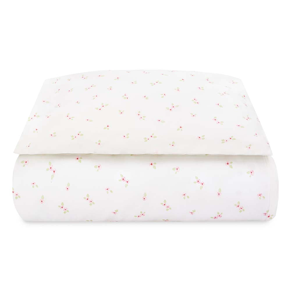 White fabric with small colorful specks on a white background