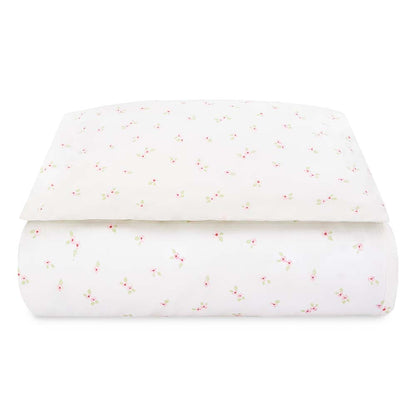 White fabric with small colorful specks on a white background