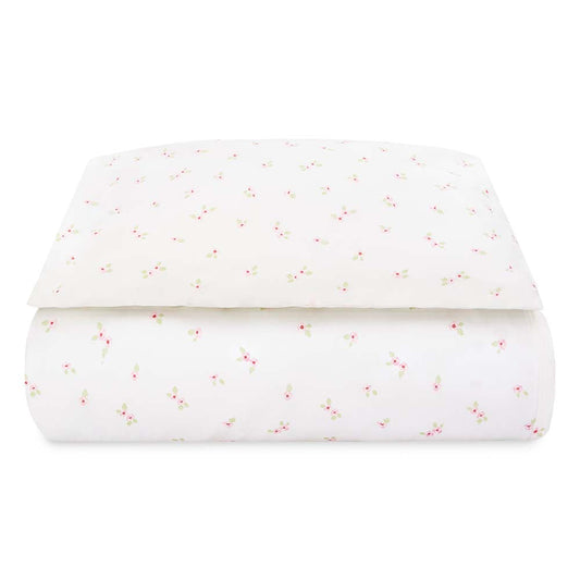 White fabric with small colorful specks on a white background