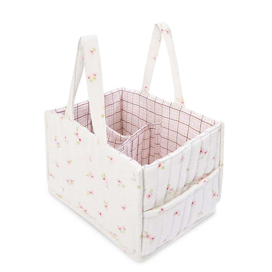 Fabric storage caddy with floral pattern on a white background