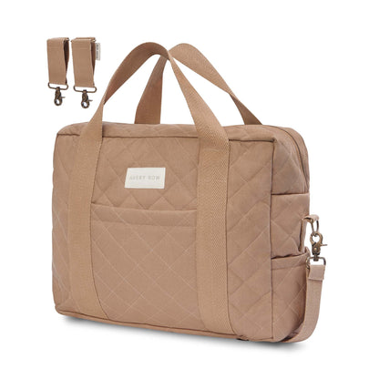 Quilted beige bag with a strap on a white background