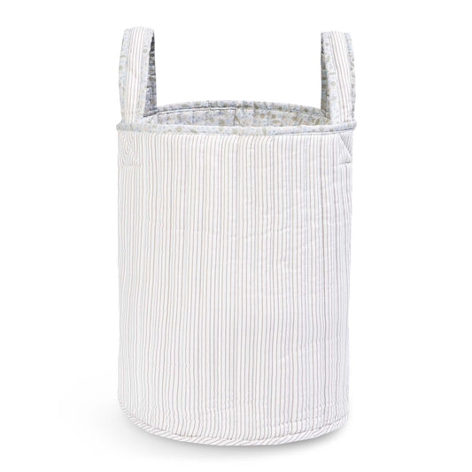 White ribbed fabric basket with handles on a white background