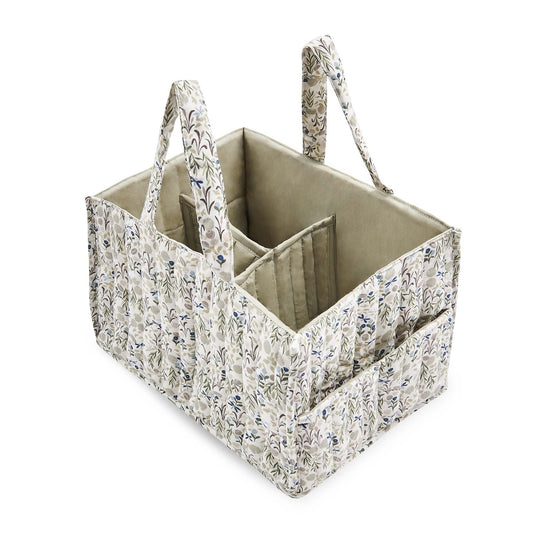 Fabric storage caddy with floral pattern on a white background