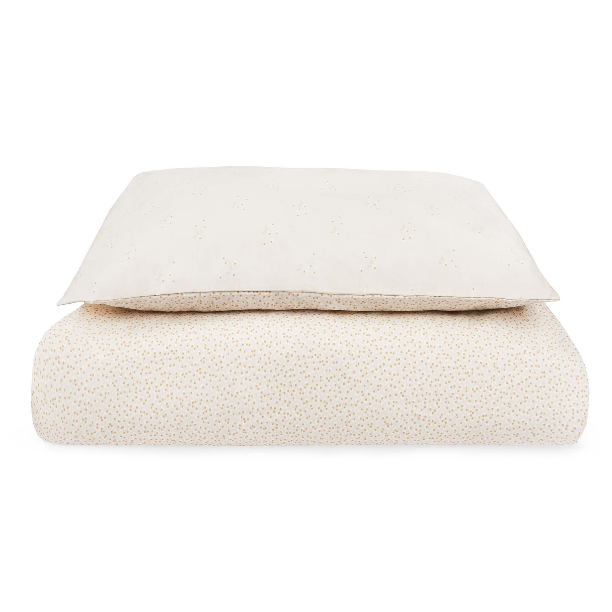 Folded beige blanket on a white background