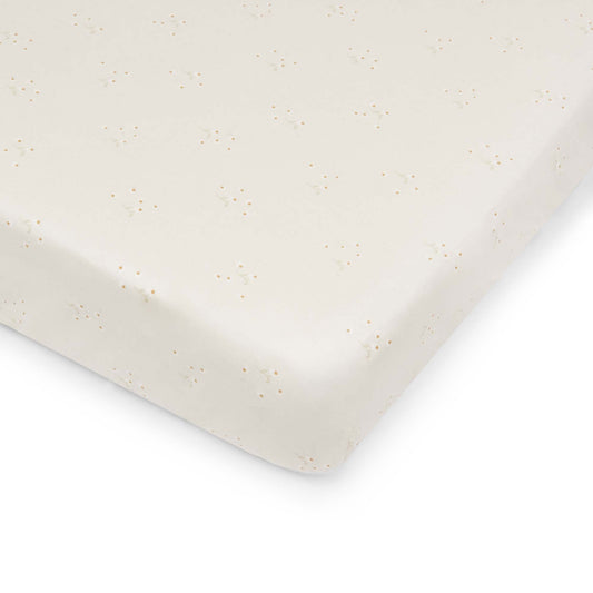 Beige fabric with subtle pattern on a white background