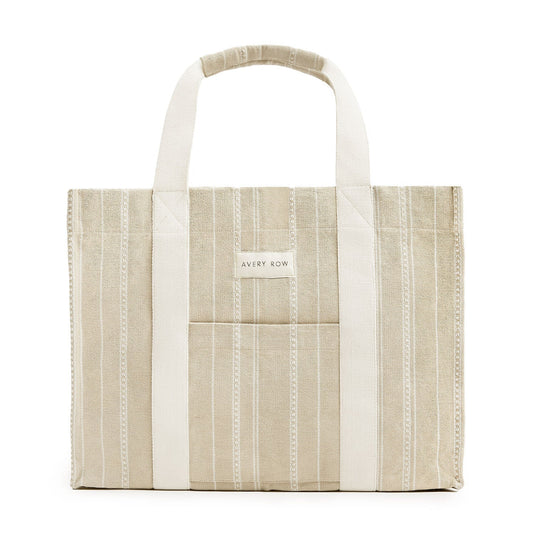 Beige and white striped tote bag with 'Avery Row' label on a white background