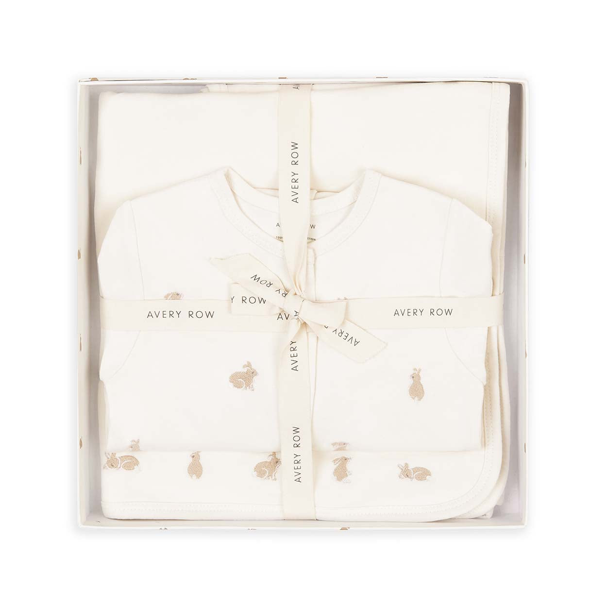 Baby outfit with bunny print in a box labeled 'Avery Row' on a white background