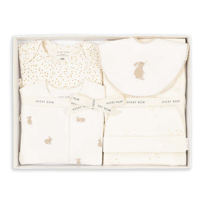 Baby clothing set with polka dot pattern in a box, featuring brand 'Every Row'.
